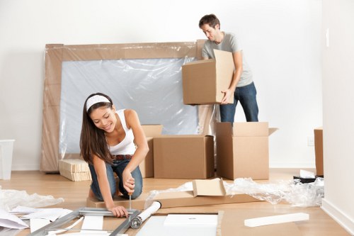 Person organizing boxes in a Bigginhill storage space