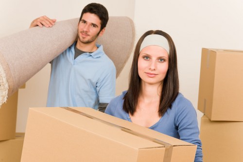 Packed boxes and furniture prepared for temporary storage in Bigginhill