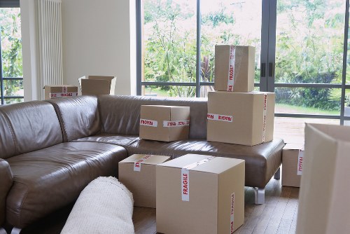 Family moving items into storage during home renovation