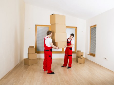 Boxes and furniture ready for a small house move in Bigginhill